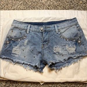 Bedazzled distressed jean shorts